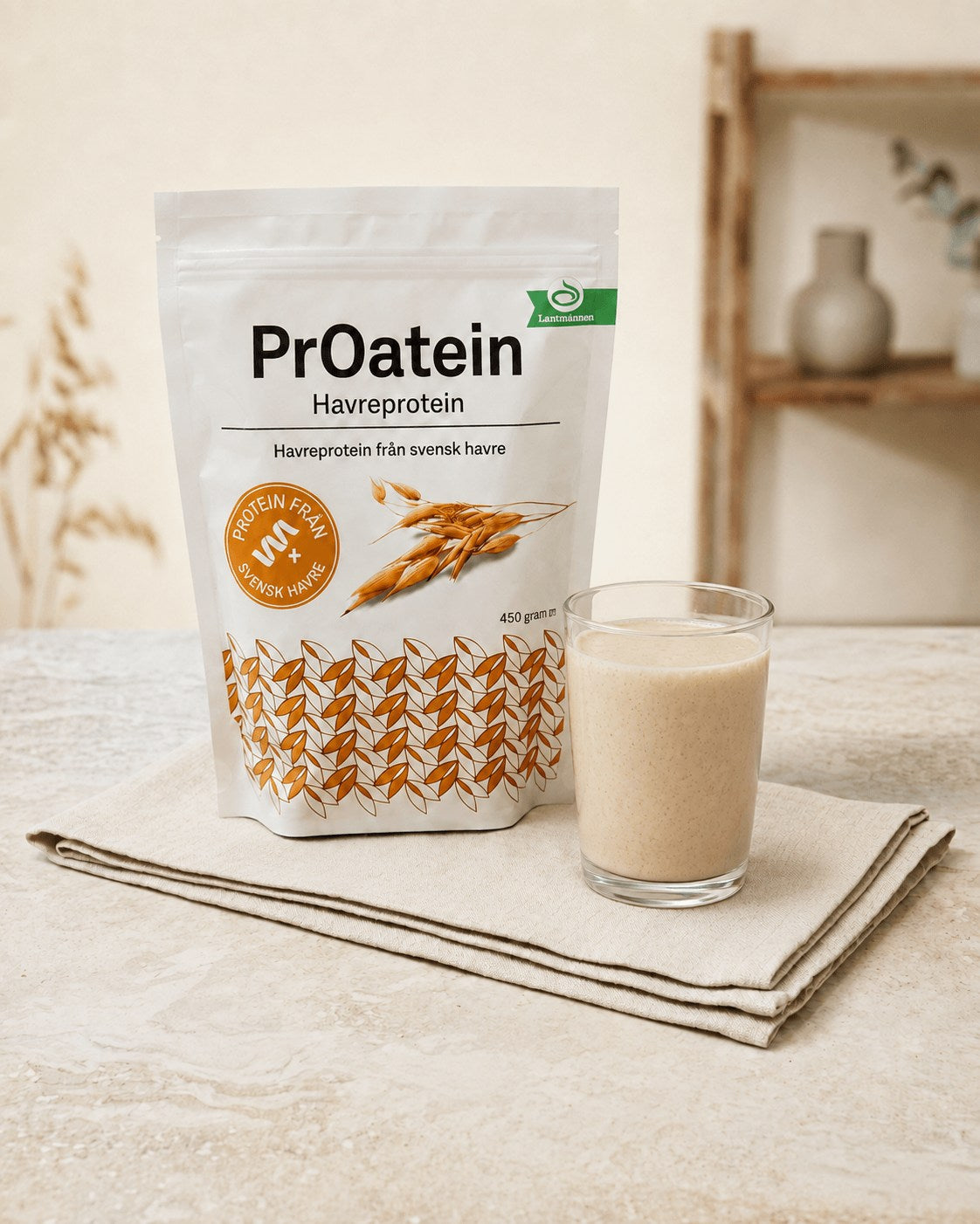 PrOatein pouch with a glass of protein smoothie on a linen napkin